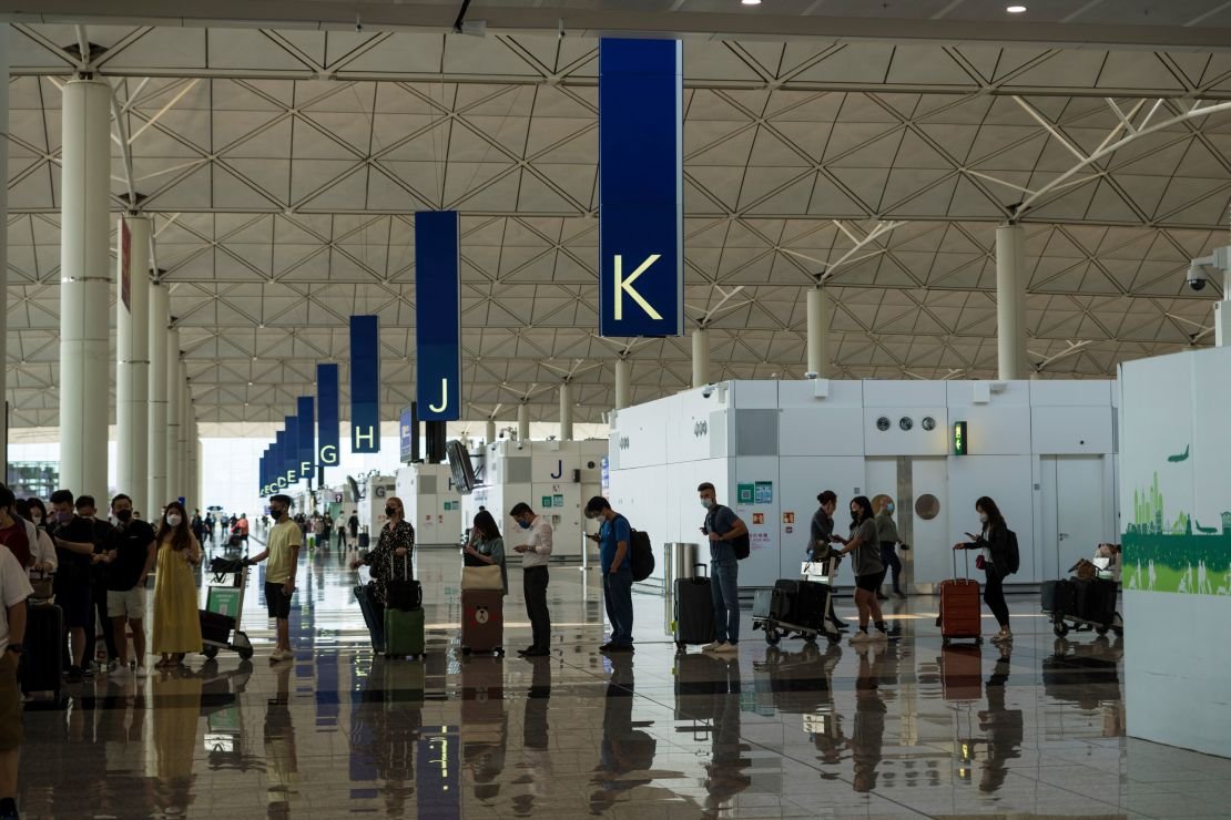 Travelers in the departure hall of Hong Kong International Airport on September 26.