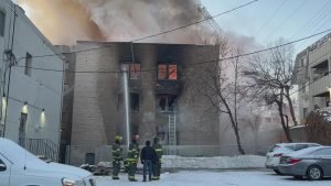 Minneapolis fire crews respond to fire at boarded up apartment building